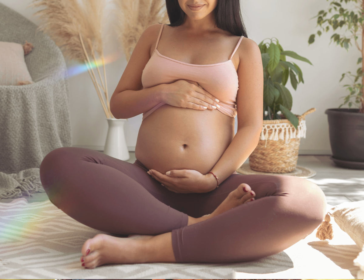 Pregnant woman sitting down