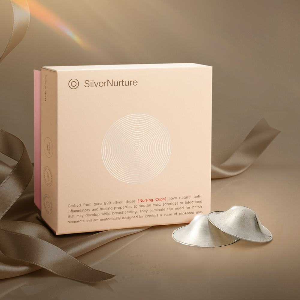 Silver nursing cups with its packaging 