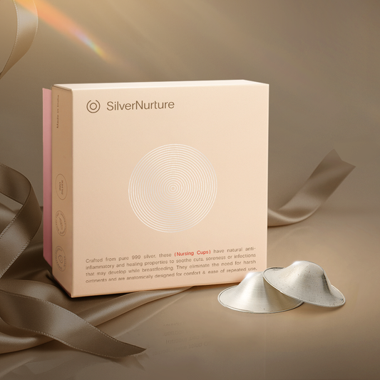 Silver nursing cups with its packaging 